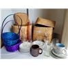 Image 1 : Wicker baskets filled with vases, candle holders and dishes