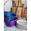 Image 2 : Wicker baskets filled with vases, candle holders and dishes