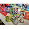 Image 2 : 1999 Pokemon slightly used activity & sticker books. Unchecked cards & action figure.