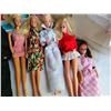 Image 5 : Lot of Barbie dolls, case, tote of clothes and accessories.
