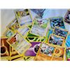 Image 2 : Pokemon. Collector tin, trainer kit cards, figurine & handbooks.