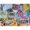 Image 3 : Pokemon. Collector tin, trainer kit cards, figurine & handbooks.