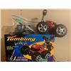 Image 1 : REMOTE CONTROL BATTERY OPERATED TUMBLING CAR. INSTRUCTIONS AND MANUAL INCLUDED