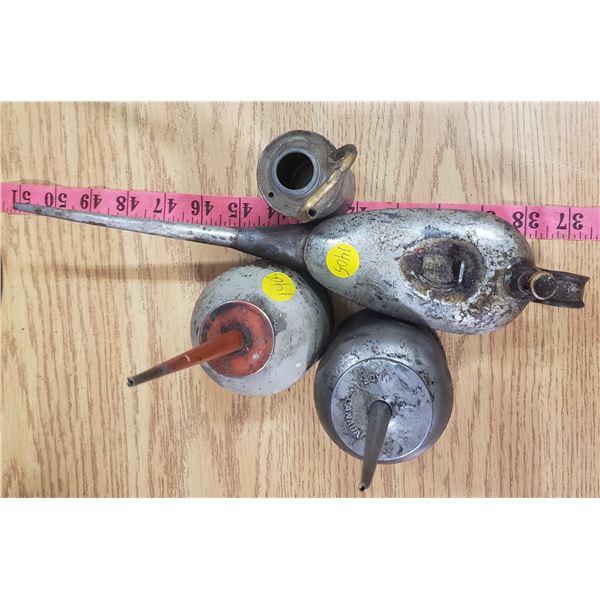 four vintage oilers oil cans at least on made in Canada