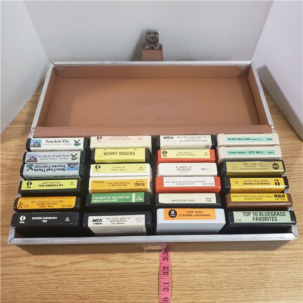 24 eight track tapes with carrying case. country blue grass Kenny Rogers Merle Haggard and head clea