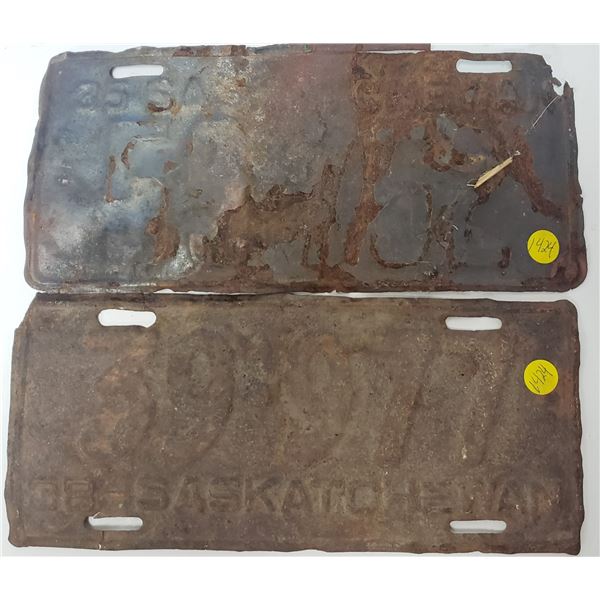 two early Saskatchewan License plates rust