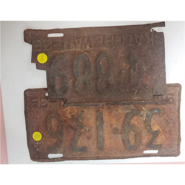 two early Saskatchewan License plates rust