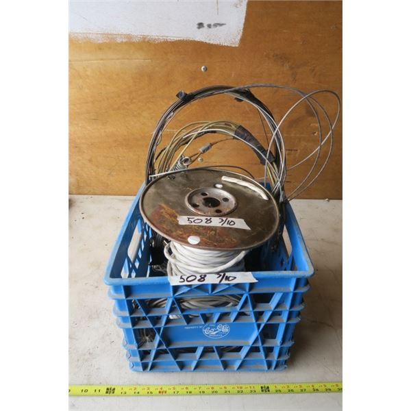 Milk Crate With Wire Spool and Cables