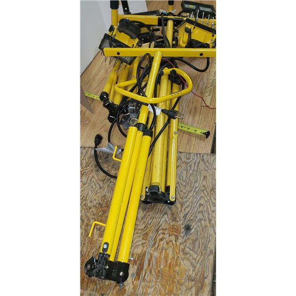 several light towers, some damaged legs, includes parts and stands