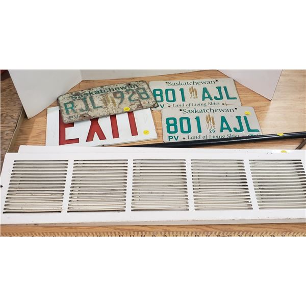 misc lot Exit sign matching license plate pair , vent cover, plumbers snake