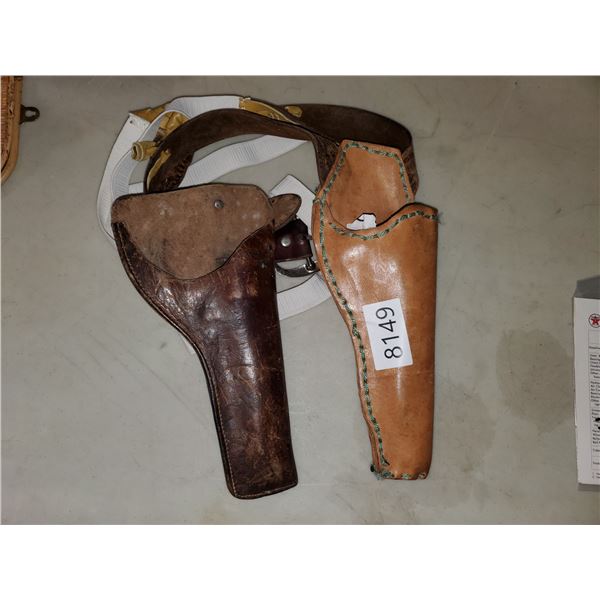 2 leather handgun holsters
