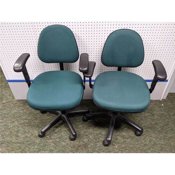 Pair of green upholstered office chairs