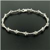Image 4 : 18K White Gold 1.65 ctw Diamond Flower Cluster Twisted Wire Link Tennis Bracelet