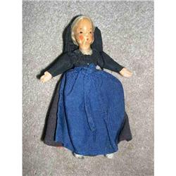 Wooden doll with wrapped legs #2086534