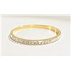 GOLD TONE BANGLE WITH WHITE RHINESTONES