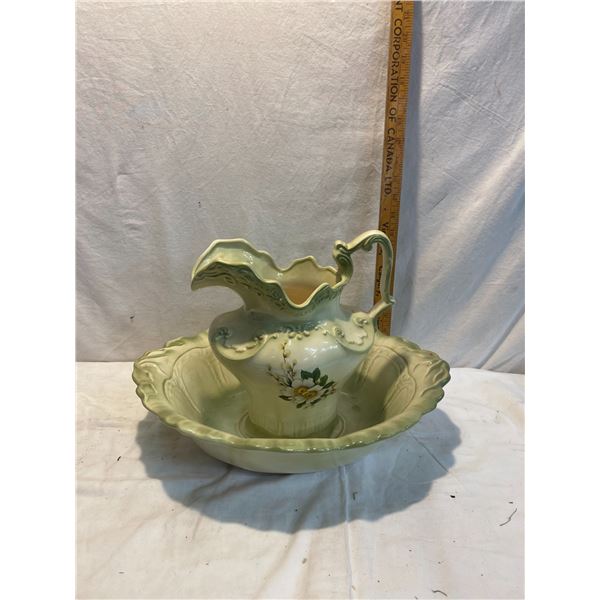 Pottery pitcher and bow
