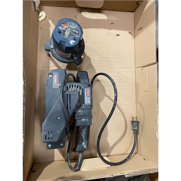 Skil sander and level item