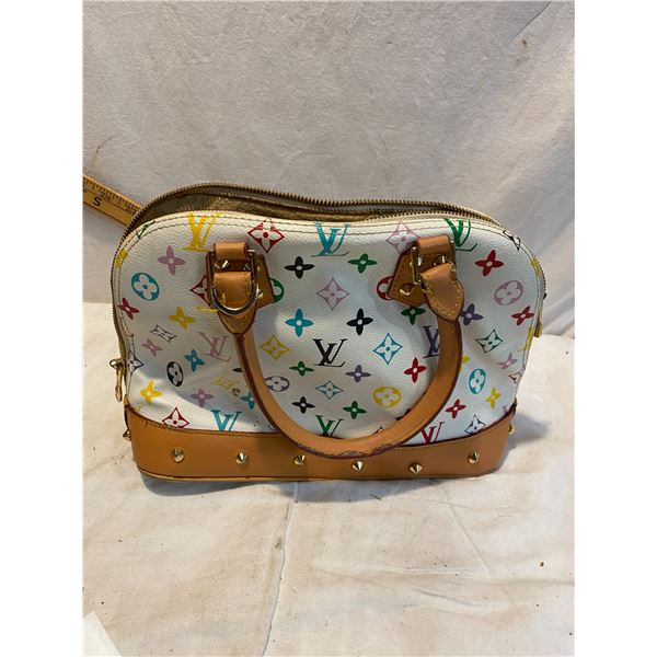 Louis Vuitton hand bag has ware