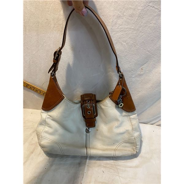 Coach purse needs cleaning