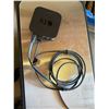 Image 1 : Apple TV box and cord