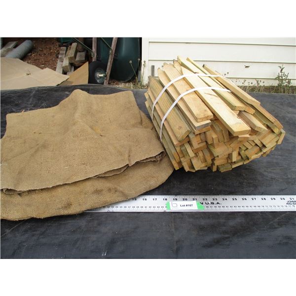 Wooden Stakes and Gunny Sack