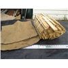 Image 1 : Wooden Stakes and Gunny Sack