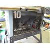 Image 6 : Delta 10" Motorized Saw with Stand on Casters Plus Manual (working)