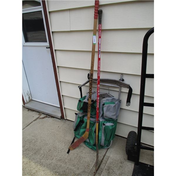 Back Pack with 2 Hockey Sticks One is Autographed Bobby Hull