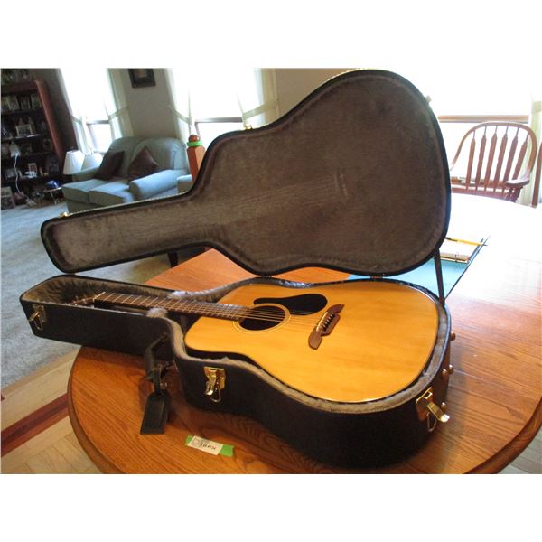 Alvarez guitar in case