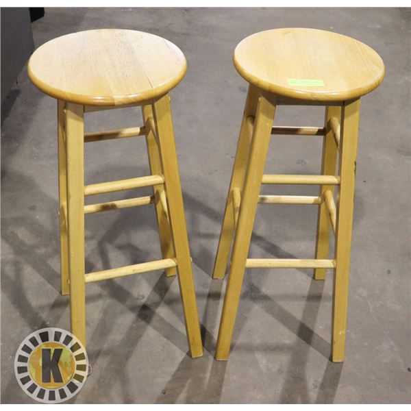 TWO MATCHING OAK STOOLS