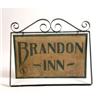 Image 1 : A PAINT-DECORATED WROUGHT IRON SIGN