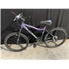 Image 1 : PURPLE REEBOK EMPRESS, 21 SPEED FRONT SUSPENSION MOUNTAIN BIKE