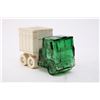 Image 1 : Glass truck, alligator teeth, decorativesand bottl