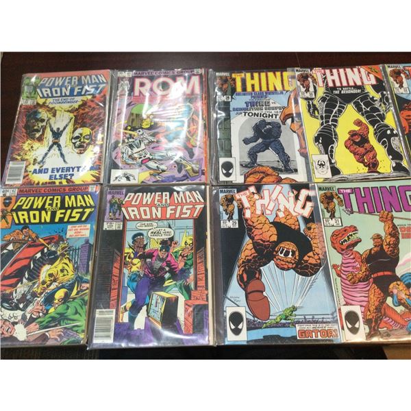 COMICS - Wholesale lot of 12 assorted comics - all individually sealed.