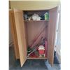 Image 2 : Storage Cabinet with various cleaning supplies