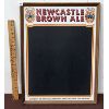 Image 1 : NEWCASTLE BROWN ALE PARTICLE BOARD SIGN - 19 X 25 INCHES