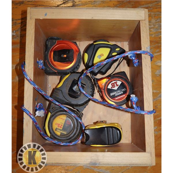 WOOD BOX FULL OF TAPE MEASURES