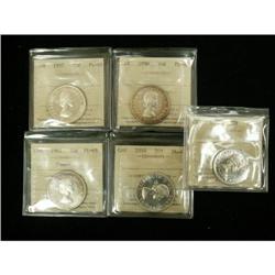 Lot of 5 ICCS graded  fifty cents;1956 ,1957,