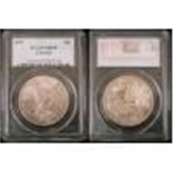 1957 $1 PCGS MS65, nicely toned. Very rare in