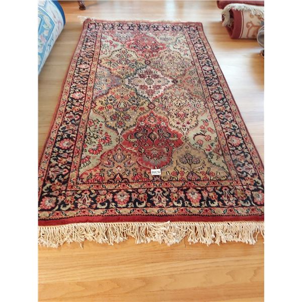 Area Rug from Jordans Furnishing 64"L x 37"W