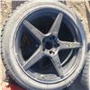 Image 2 : four 18" black rims five bolt with well worn tires 245/45R18