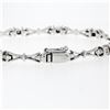 Image 7 : 14K White Gold 7" .33 ctw Bezel Set Diamond & Figure "X" Link Tennis Bracelet