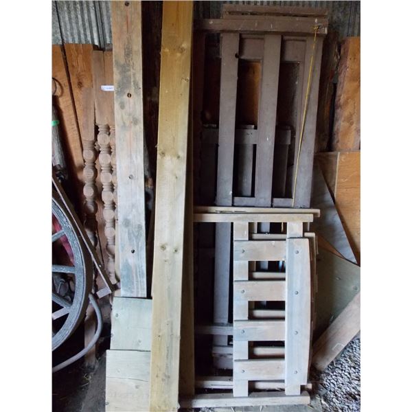assorted lumber pieces and wooden spindles