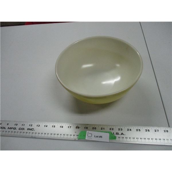 Yellow colored Pyrex mixing bowl