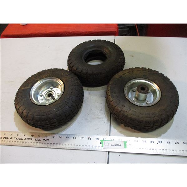 3 utility tires (2 with rims) 4.10/3.50