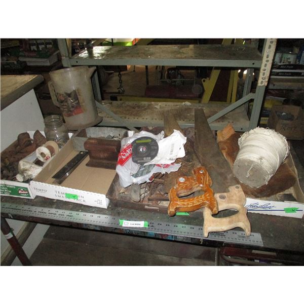 hand saws, oil container, misc