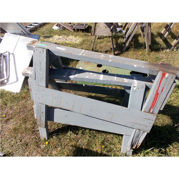 pairs of wooden sawhorses