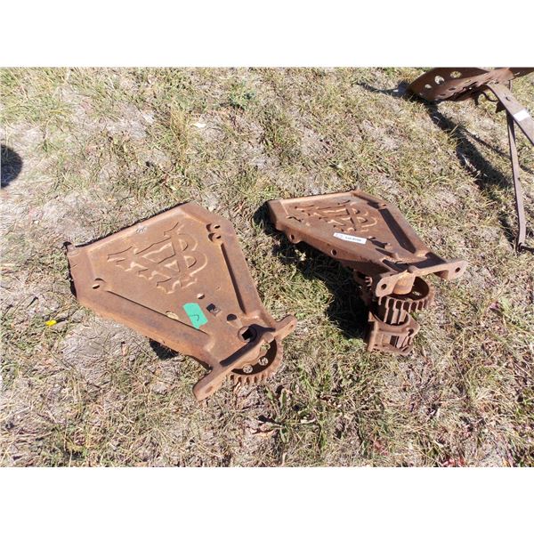 pair of cast iron van brant grain drill ends
