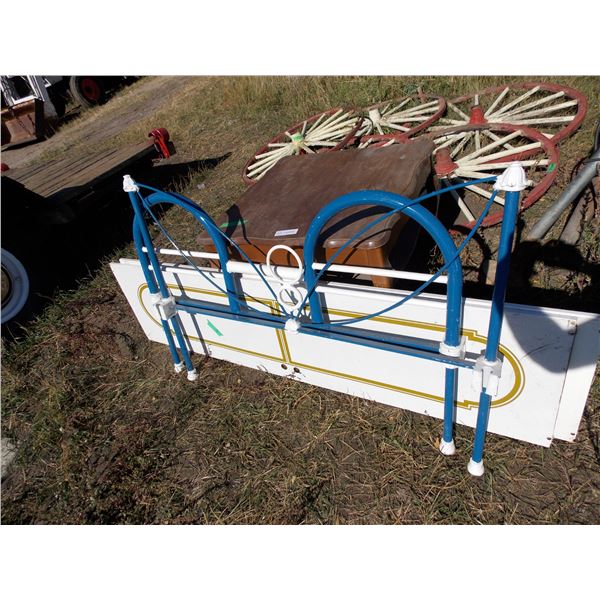 cast iron bed frame with wooden end table