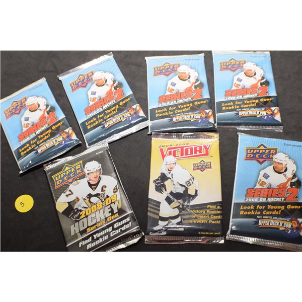 7 packs of sealed Hockey cards
